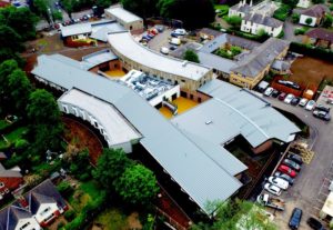 Multi-discipline project with flat roofs, cladding and pitched roofs
