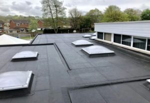 Flat Roof on school with rooflights and single ply membrane