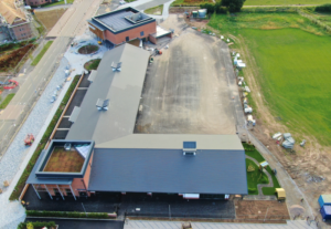 multi-discipline project on a school with pitched, flat, hard metal and green roof elements